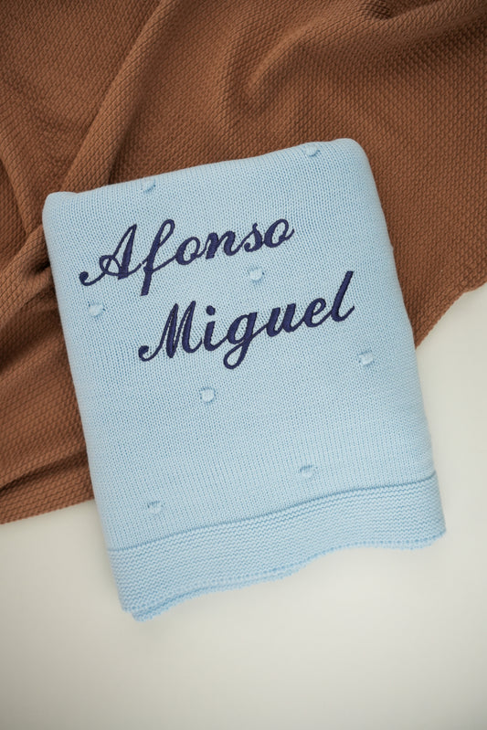 Manta malha com pompom