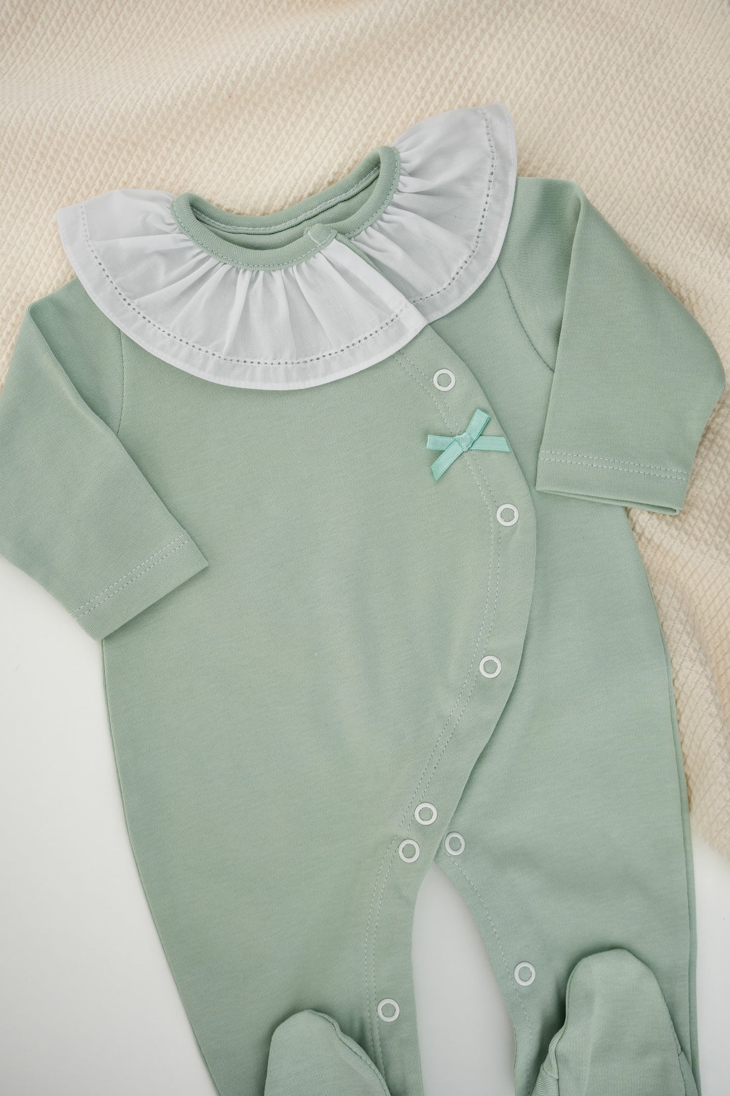 Babygrow algodão com laço